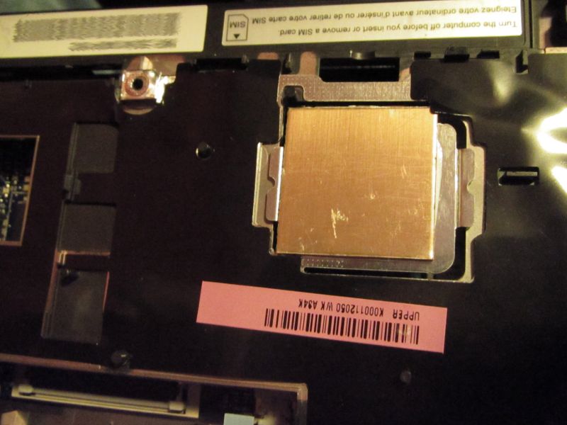 Toshiba AC100 CPU-side shim in place on the spring plate